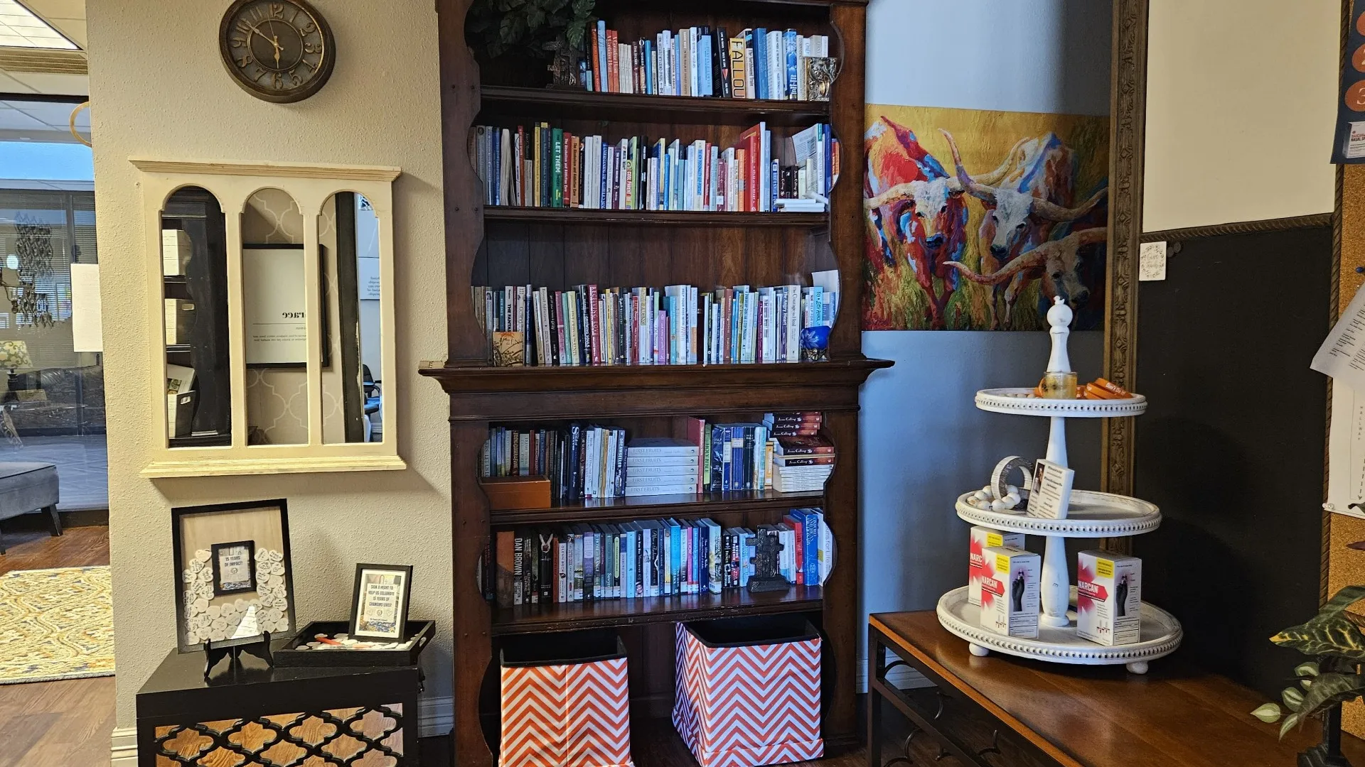 The recovery library bookcase and a table of free Narcan kits